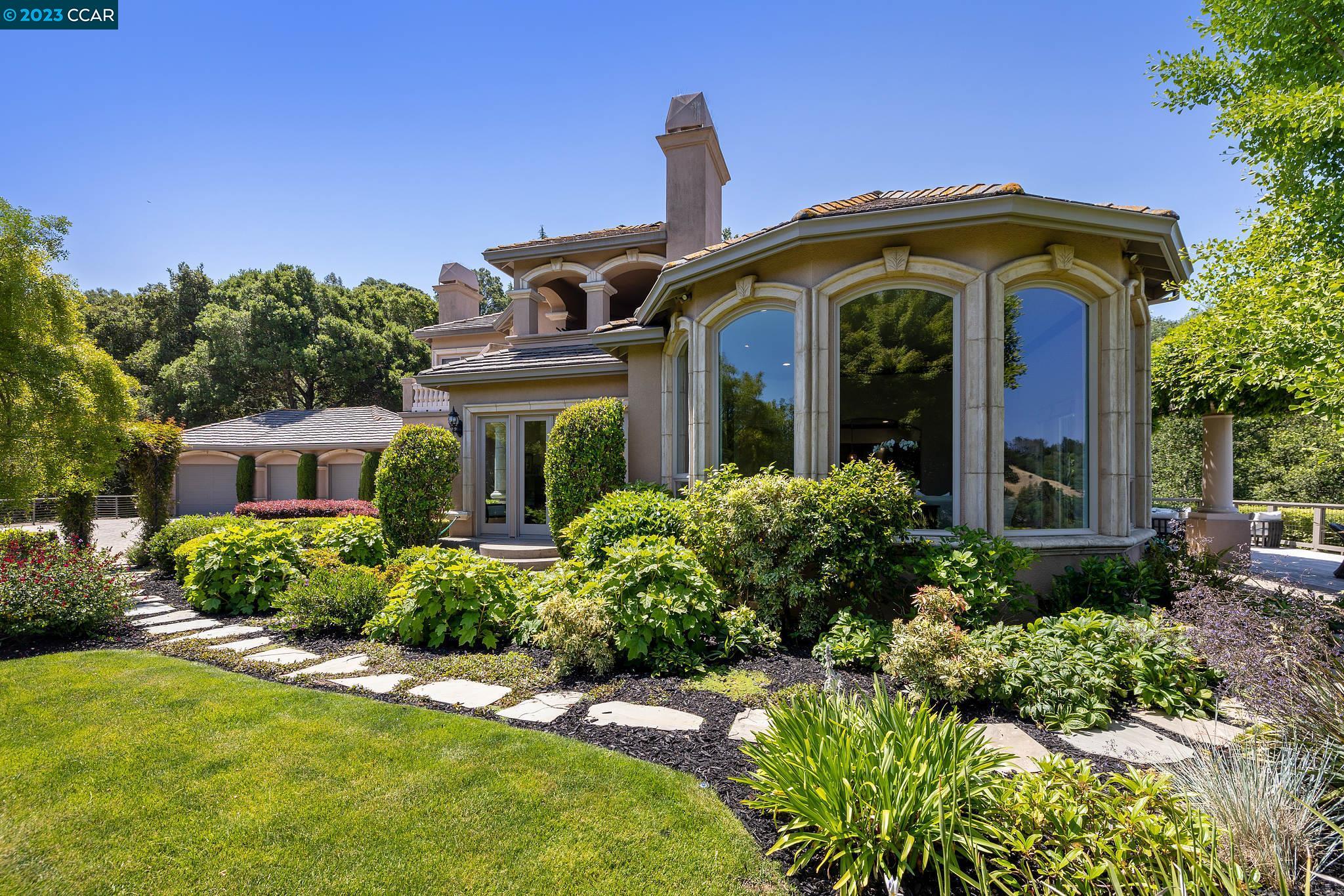 2 Dalewood Terrace Orinda, CA 94563 - Photo 1 of 1 a front view of a house with garden