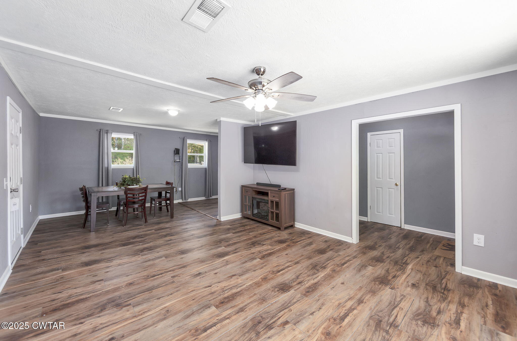 668 Bowman Road Medon, TN 38356 - Photo 4 of 24 a view of a livingroom with furniture and a fireplace
