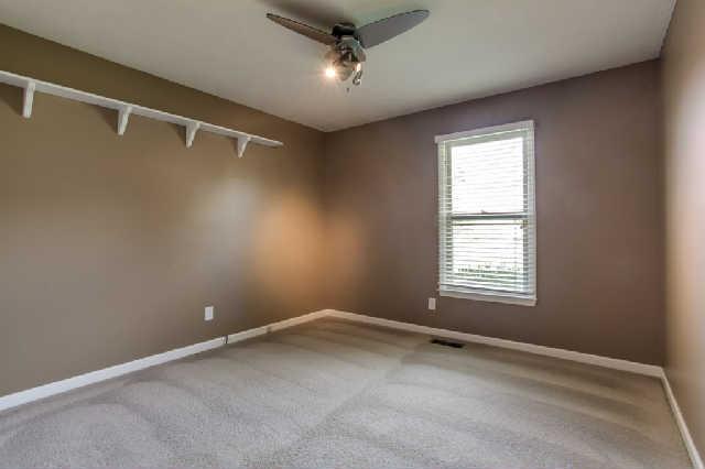 2122 Sulphur Springs Road Murfreesboro, TN 37129 - Photo 11 of 20 Spare Bedroom 2 with ceiling fan and freshly cleaned carpets. This one features a good sized walk in closet
