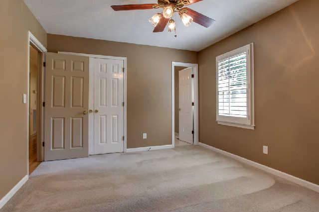 2122 Sulphur Springs Road Murfreesboro, TN 37129 - Photo 12 of 20 Master bedroom with shutter blinds and full bath. Carpets cleaned in here too