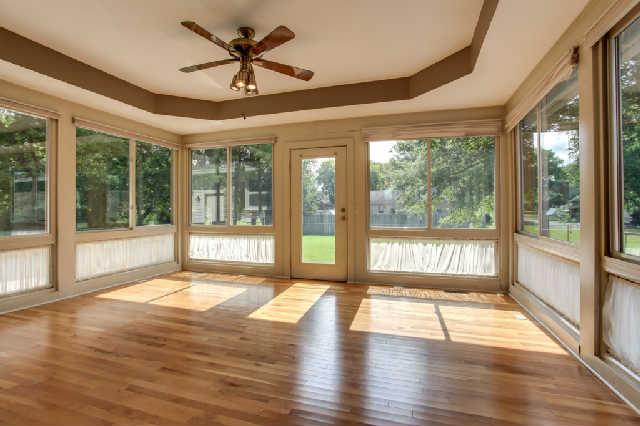 2122 Sulphur Springs Road Murfreesboro, TN 37129 - Photo 8 of 20 CHECK OUT THIS FLORIDA ROOM!! Glass all around, hardwood floors, tray ceiling, HVAC helps keep the temp regulated and fantastic views of the back yard!