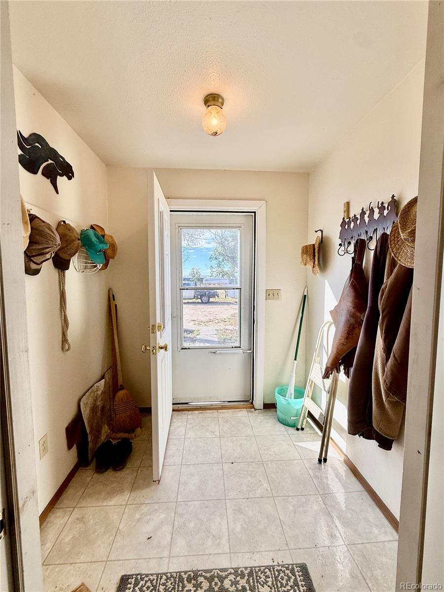6216 Moreland Road Boone, CO 81025 - Photo 10 of 37 a view of a room with gym equipment