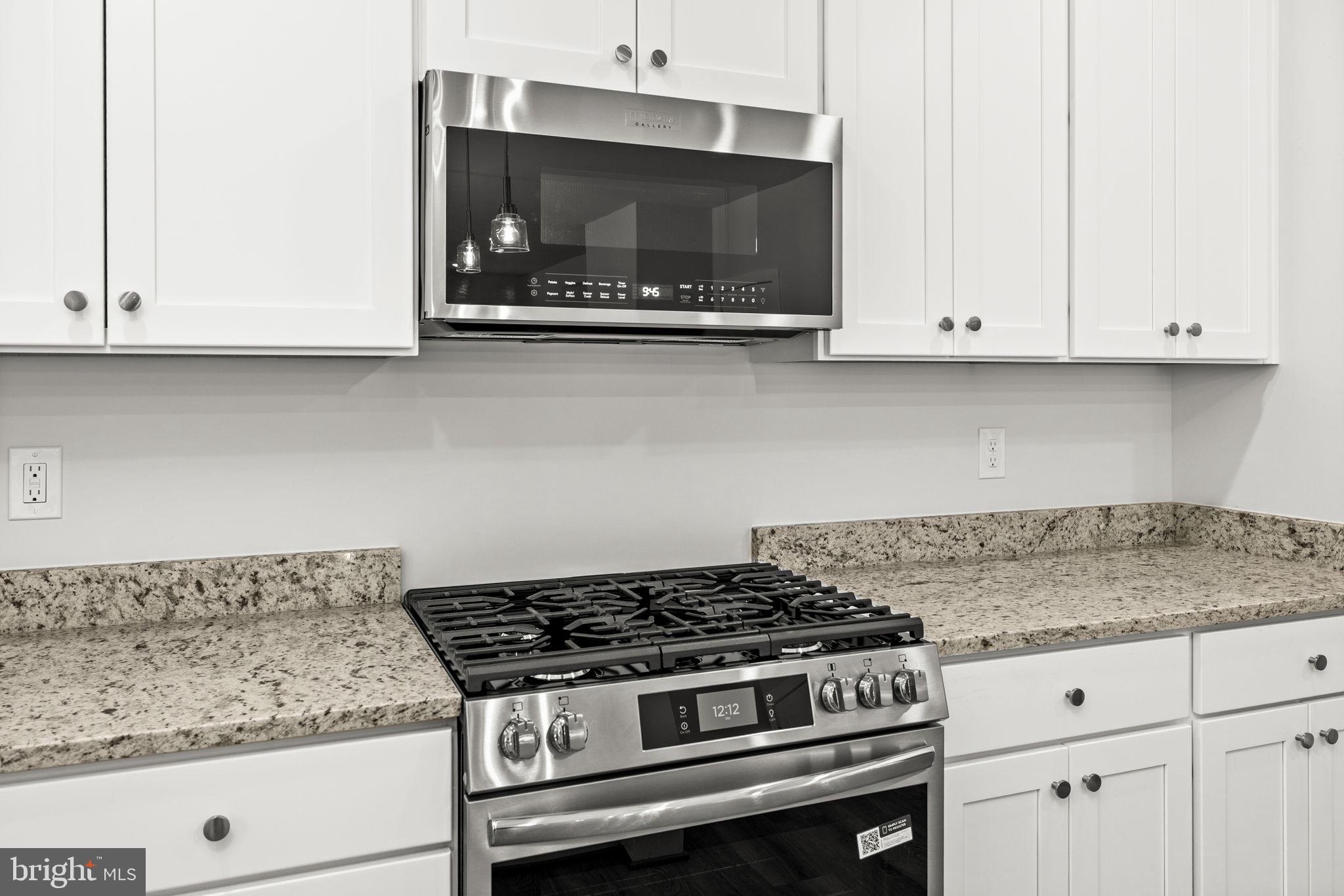 137 Indiantown Road King George, VA 22485 - Photo 13 of 31 Gas cooking setup w/ built-in microwave