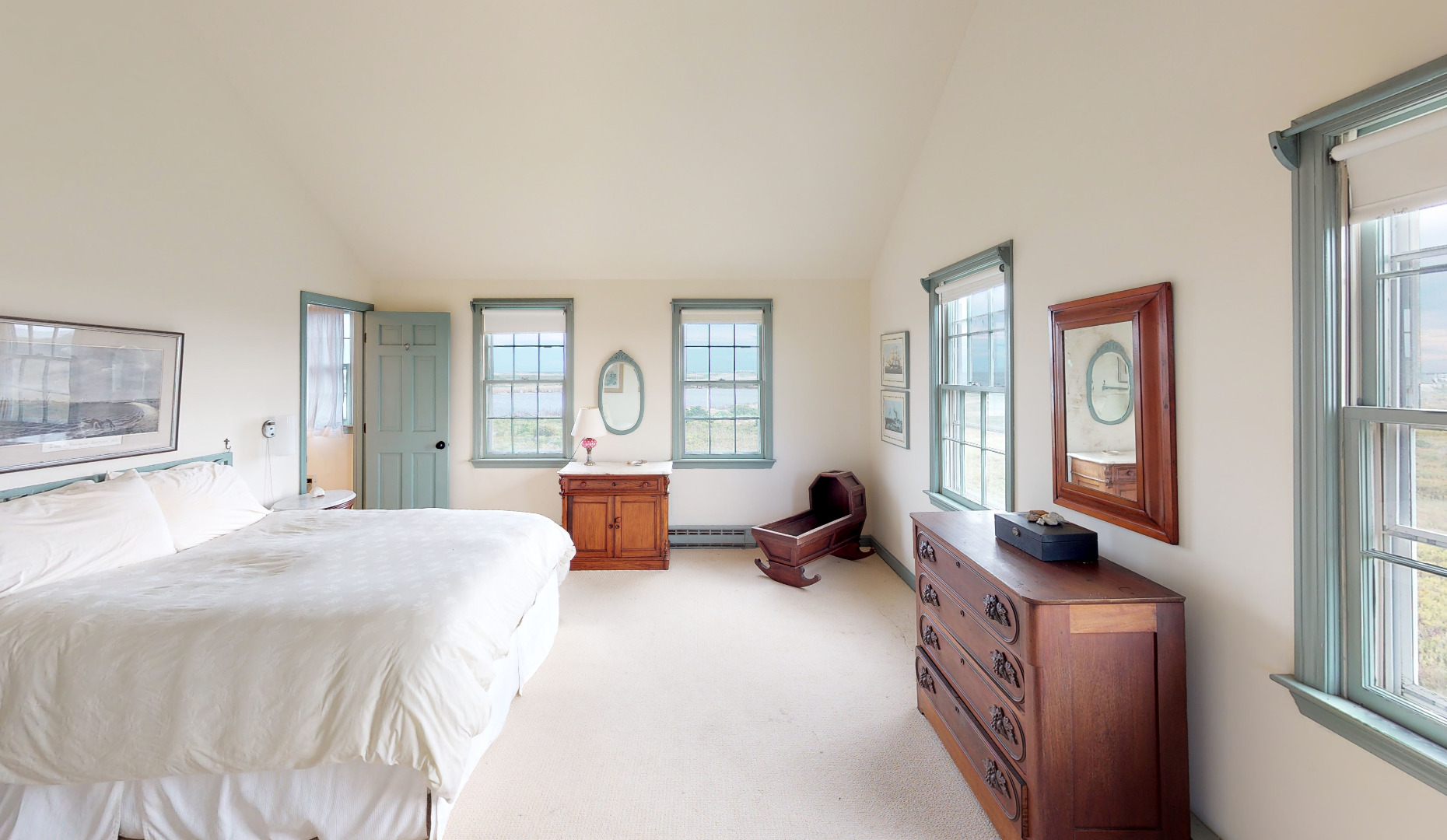43 West Miacomet Road Nantucket, MA 02554 - Photo 12 of 22 a bedroom with furniture and a large window