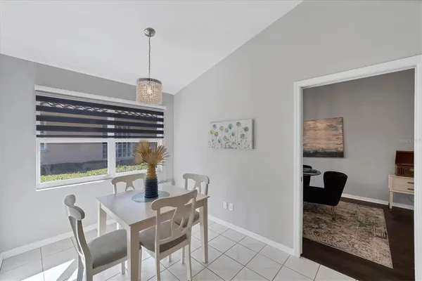 a view of a dining room with furniture
