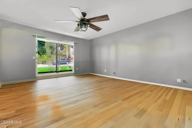 a bathroom with a granite countertop sink