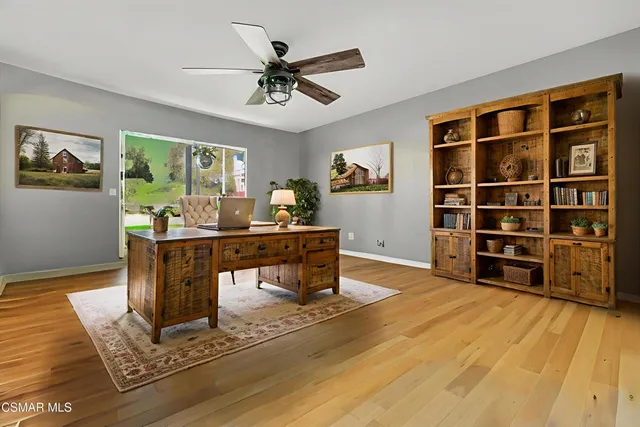 a white toilet sitting next to a bath tub shower