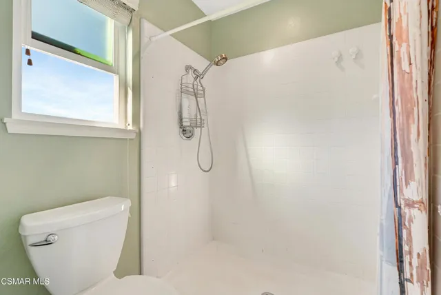 a view of a backyard with a patio