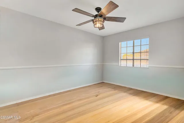 a view of a backyard with sitting area