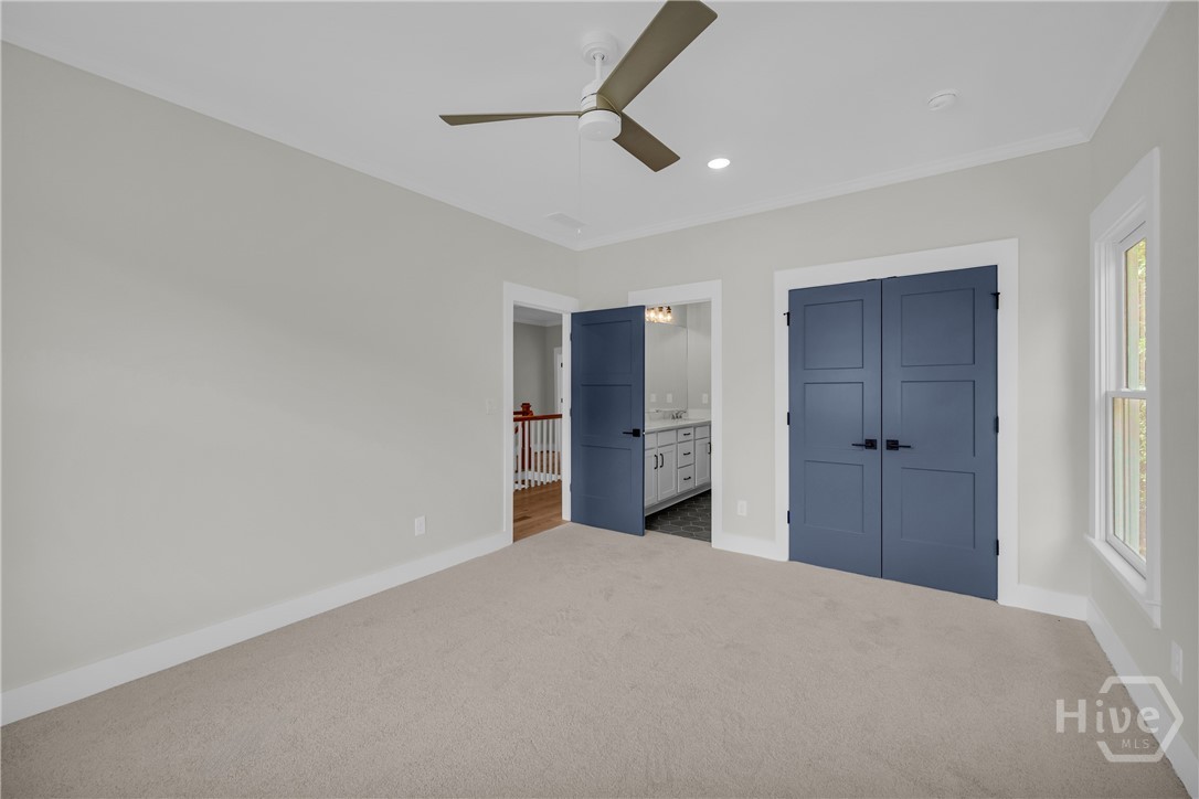 2476 St Martin Way Monroe, GA 30656 - Photo 58 of 75 Neutral tone carpeting complements light gray wall paint