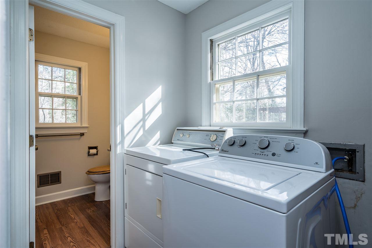 4516 Connell Drive Raleigh, NC 27612 - Photo 14 of 28 a utility room with dryer and washer