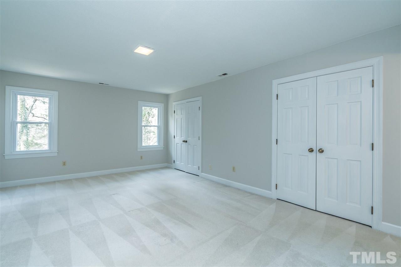 4516 Connell Drive Raleigh, NC 27612 - Photo 15 of 28 a view of an empty room with a window