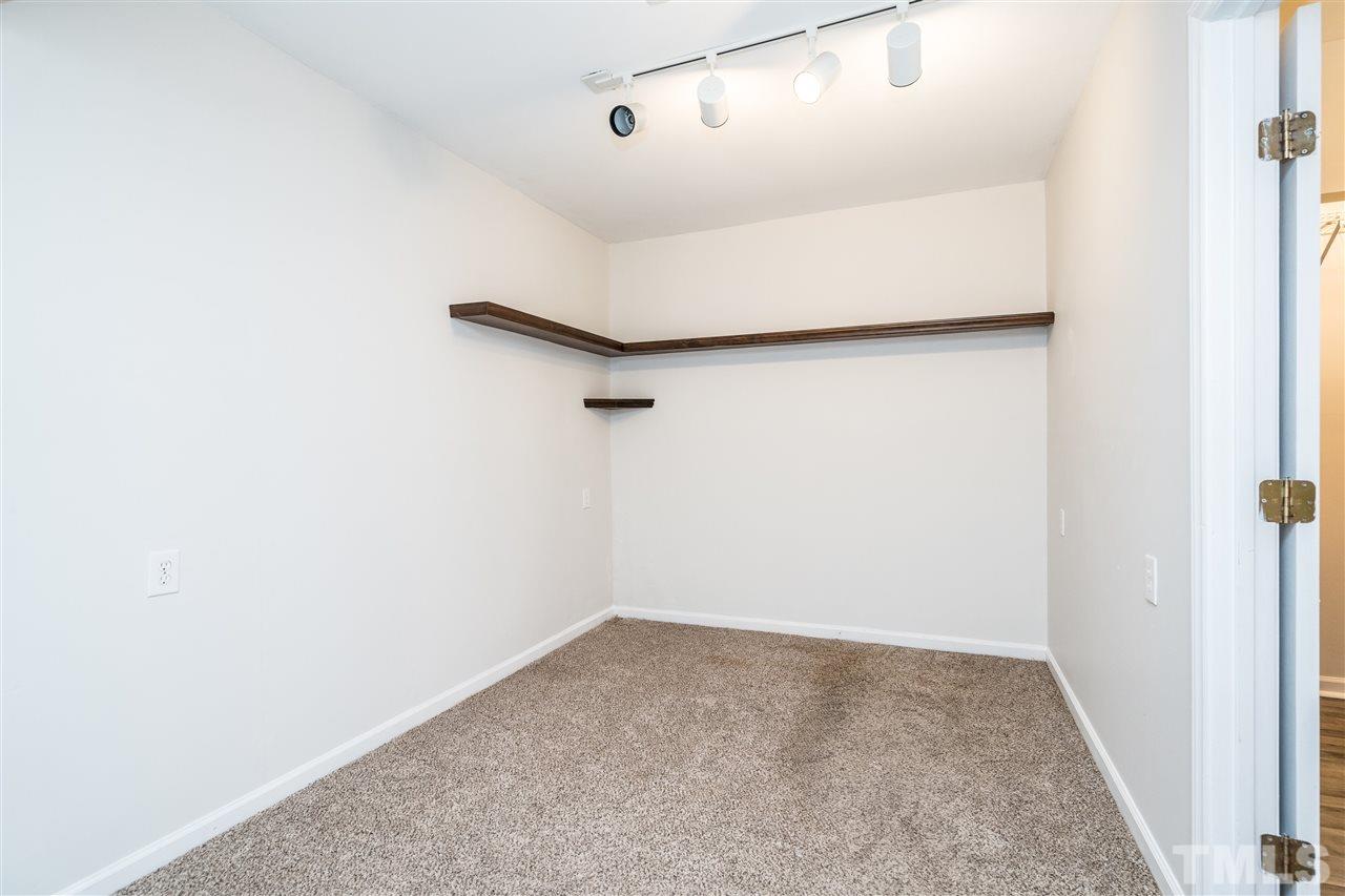 4516 Connell Drive Raleigh, NC 27612 - Photo 25 of 28 a view of an empty room