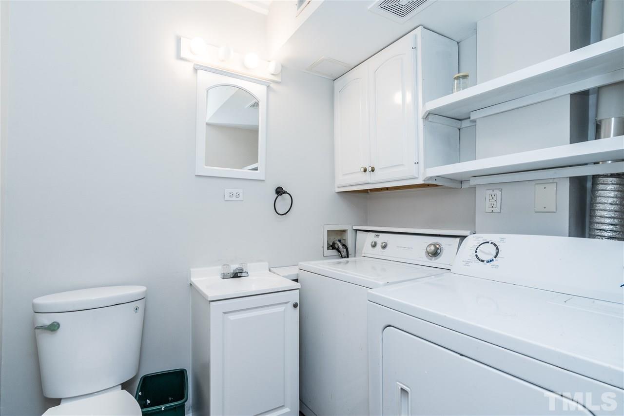 4516 Connell Drive Raleigh, NC 27612 - Photo 26 of 28 a utility room with dryer and washer