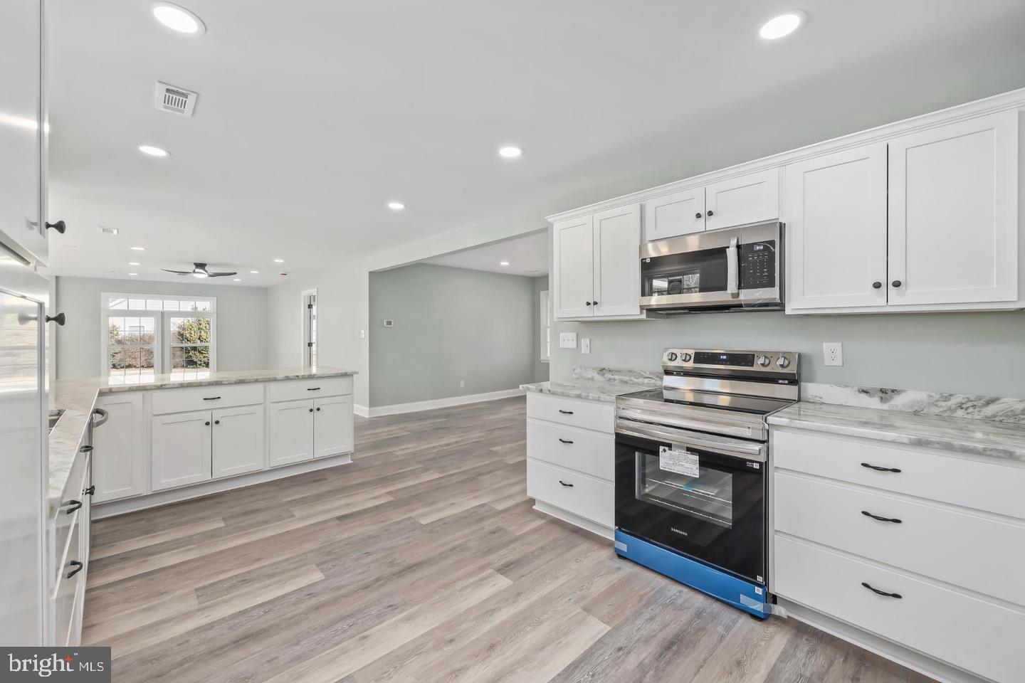 2755 Sunnybank Road Reedville, VA 22539 - Photo 14 of 57 Modern kitchen with sleek finishes.