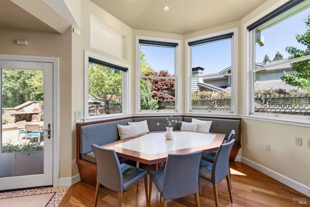 a bathroom with a sink a mirror and a light fixture