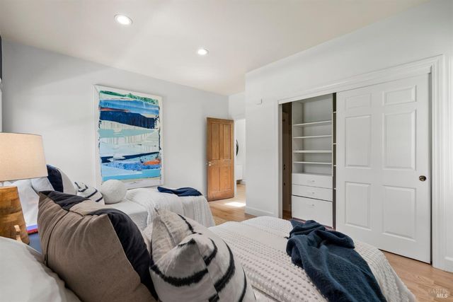 a view of a patio with a table and chairs