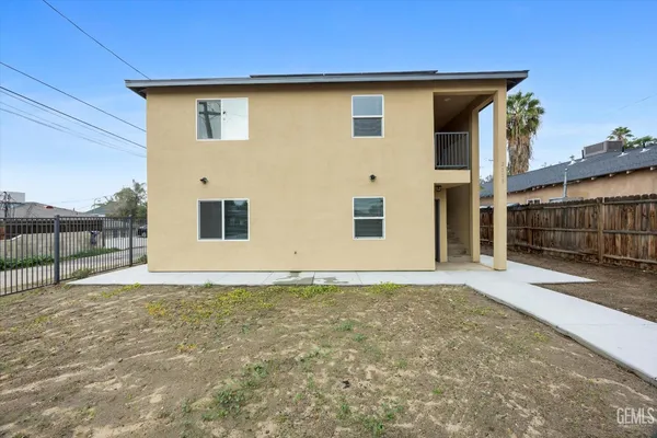 a view of backyard of house