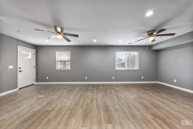 a view of an empty room with a window