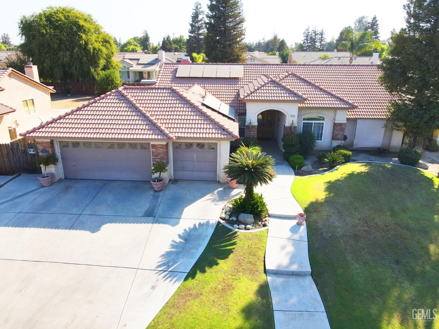 Undisclosed Address Bakersfield, CA 93313 - Photo 17 of 17 a aerial view of a house with swimming pool and sitting area