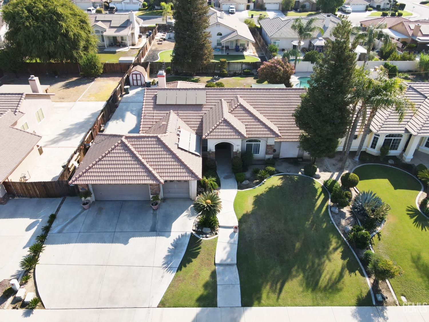 Undisclosed Address Bakersfield, CA 93313 - Photo 2 of 17 a view of outdoor space yard and swimming pool