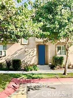 4473 Bigem Court Riverside, CA 92501 - Photo 15 of 20 a front view of a house with a yard