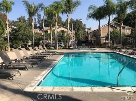 4473 Bigem Court Riverside, CA 92501 - Photo 18 of 20 a view of swimming pool with chairs