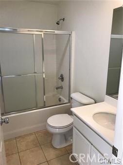 4473 Bigem Court Riverside, CA 92501 - Photo 8 of 20 a bathroom with a toilet a sink and shower