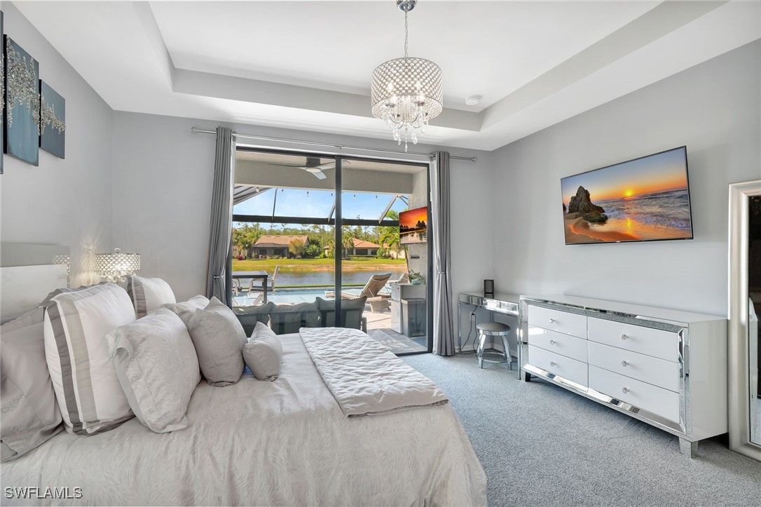 10908 Clarendon Street Fort Myers, FL 33913 - Photo 19 of 49 a bedroom with furniture and a large window