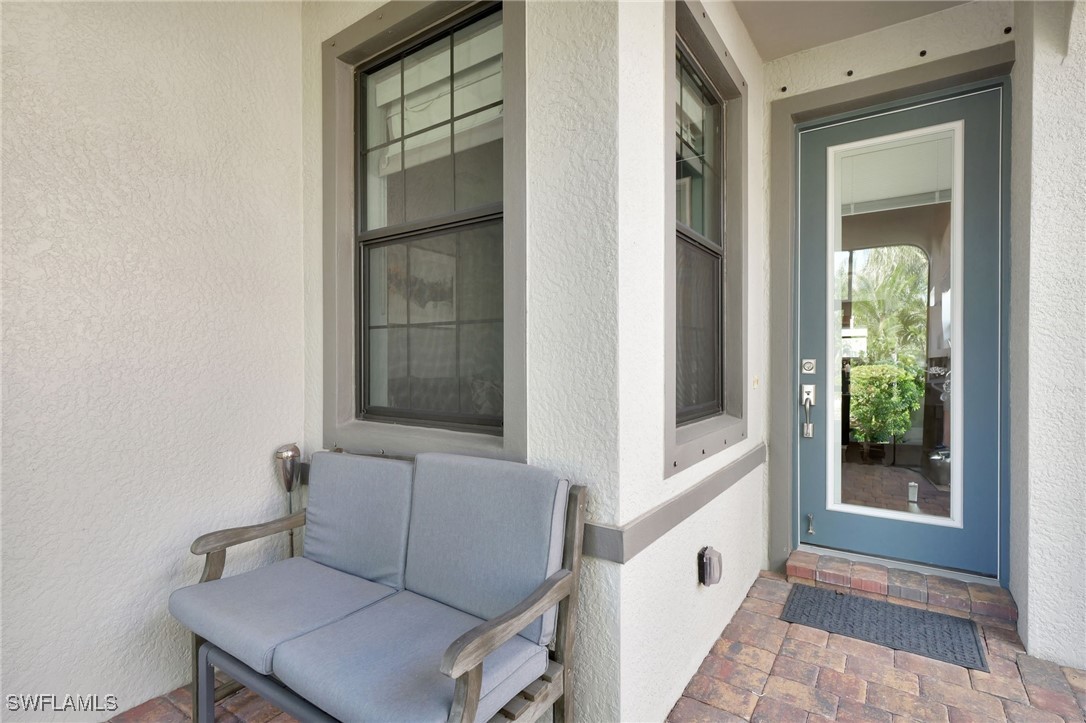 10908 Clarendon Street Fort Myers, FL 33913 - Photo 2 of 49 a view of an entryway with sitting area