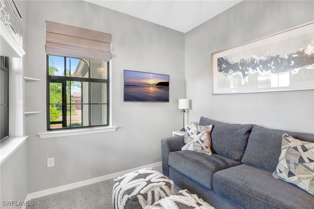 10908 Clarendon Street Fort Myers, FL 33913 - Photo 25 of 49 a living room with furniture and a window