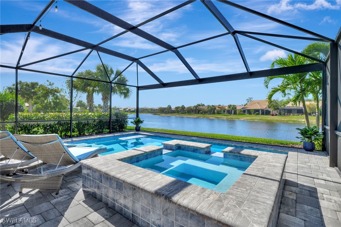 10908 Clarendon Street Fort Myers, FL 33913 - Photo 33 of 49 a view of swimming pool with a patio and a yard