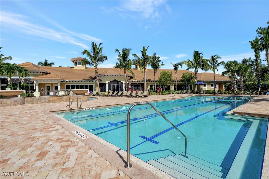 10908 Clarendon Street Fort Myers, FL 33913 - Photo 41 of 49 a view of swimming pool with outdoor seating