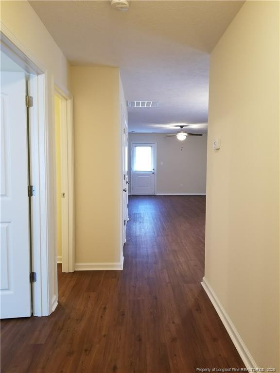 2402 7th Street Road, Unit B Lumberton, NC 28358 - Photo 2 of 10 a view of empty room with wooden floor