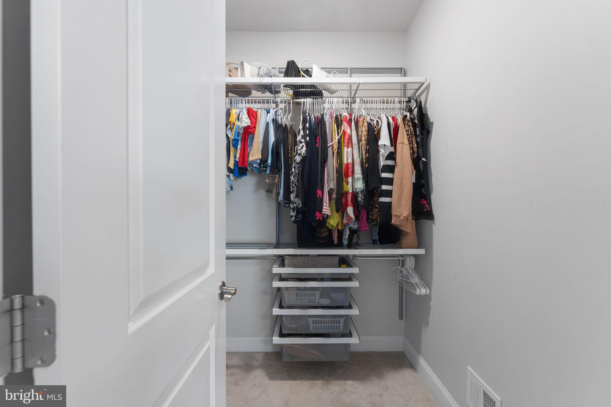 17372 Redshank Road Dumfries, VA 22026 - Photo 24 of 51 a view of walk in closet with clothes and shoes