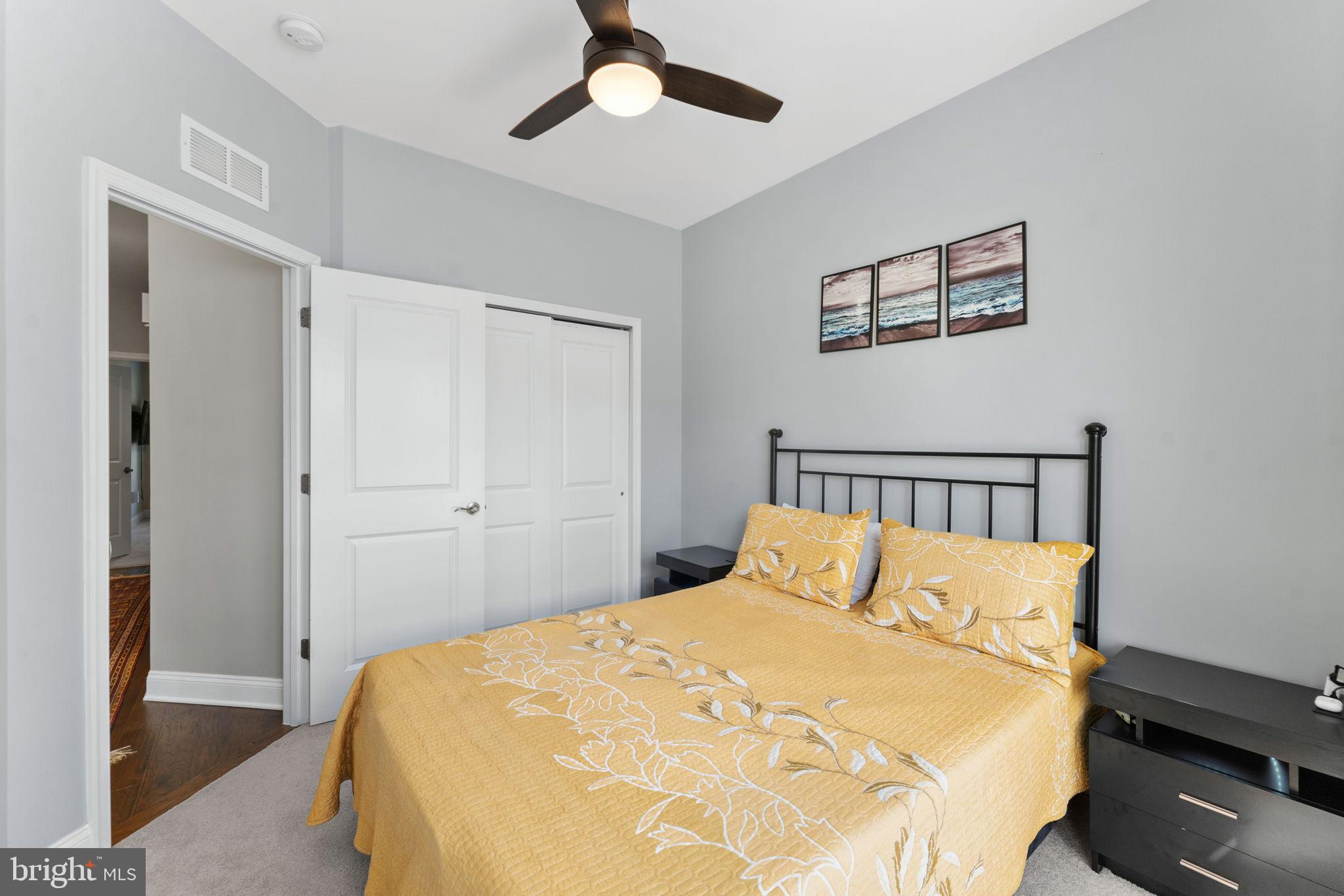 17372 Redshank Road Dumfries, VA 22026 - Photo 28 of 51 a bed room with a bed and a painting