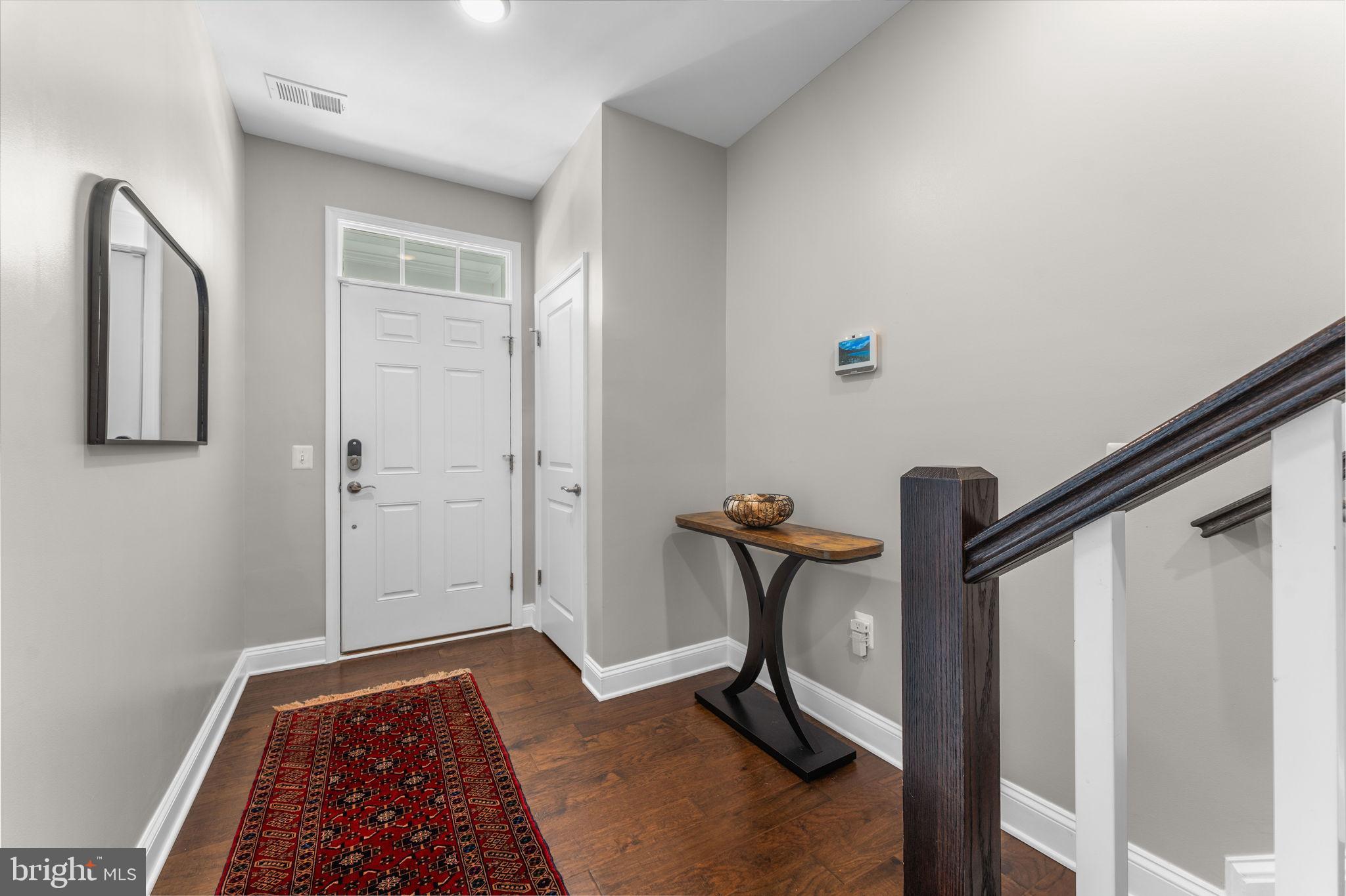 17372 Redshank Road Dumfries, VA 22026 - Photo 3 of 51 a view of a hallway with closet