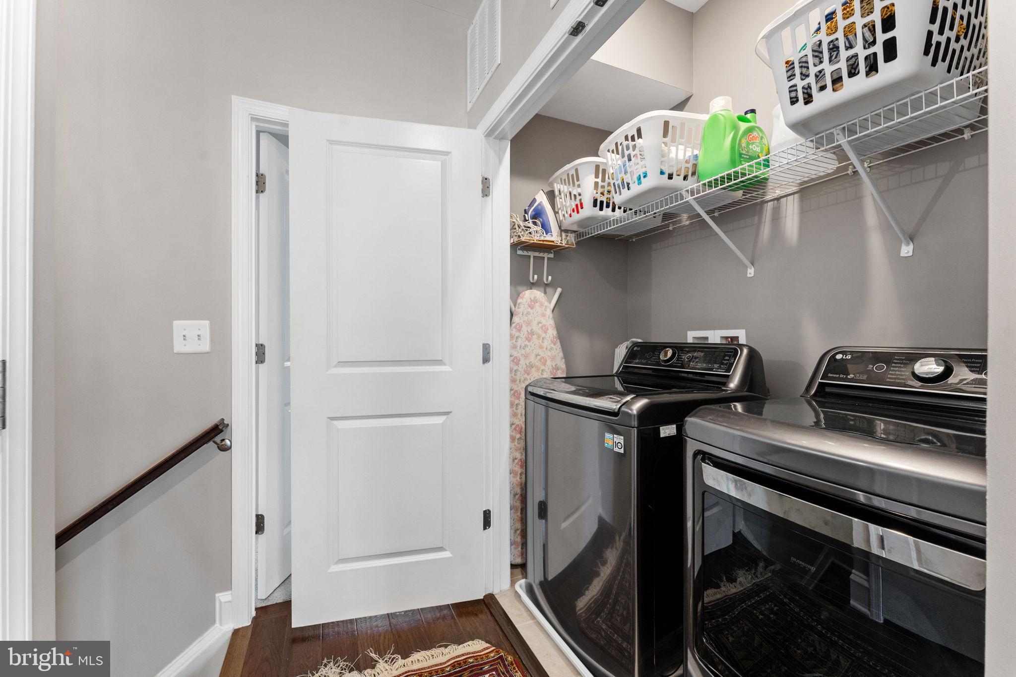 17372 Redshank Road Dumfries, VA 22026 - Photo 33 of 51 a kitchen with stainless steel appliances granite countertop a stove and a refrigerator