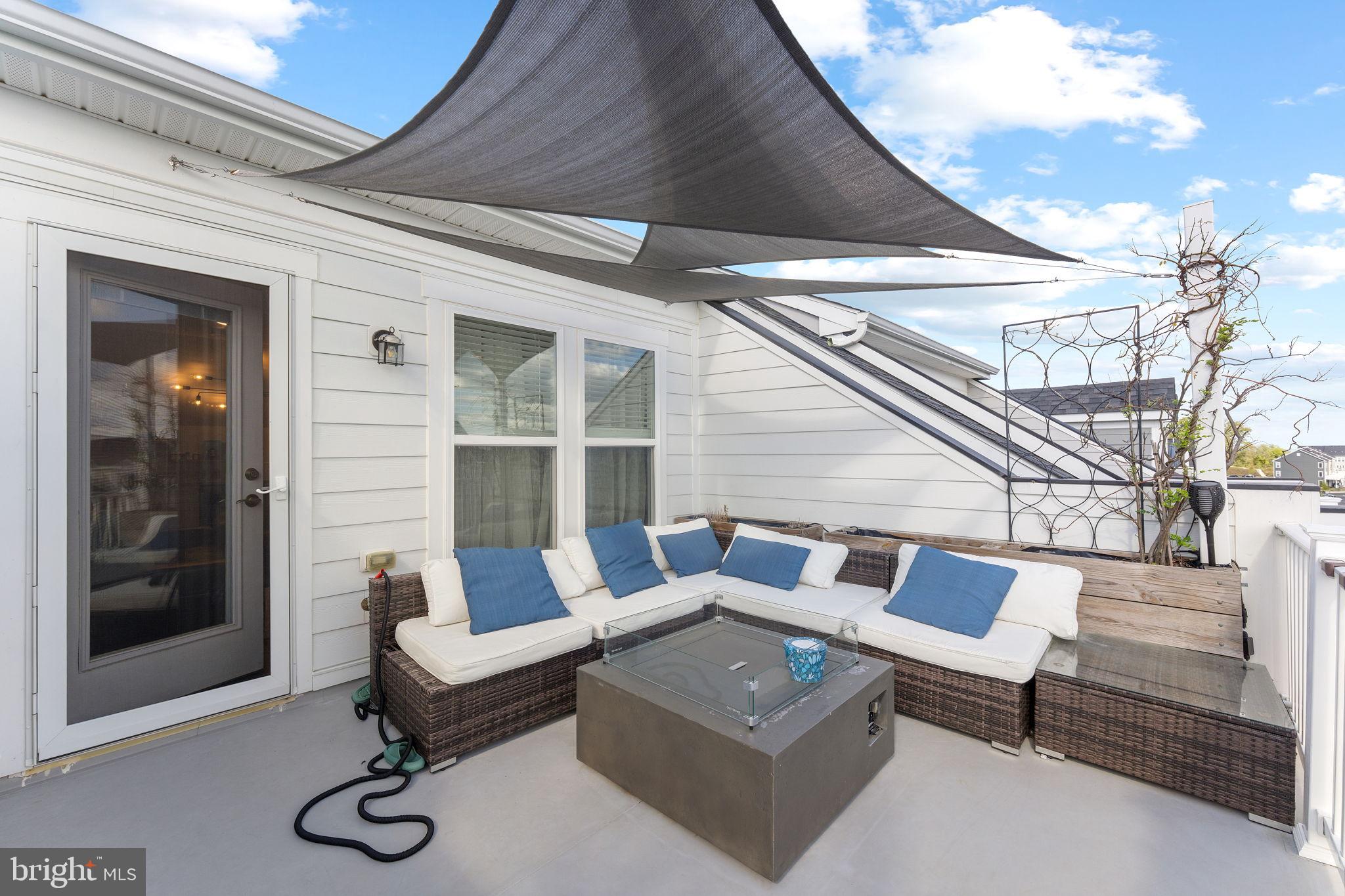 17372 Redshank Road Dumfries, VA 22026 - Photo 38 of 51 a building outdoor space with patio furniture