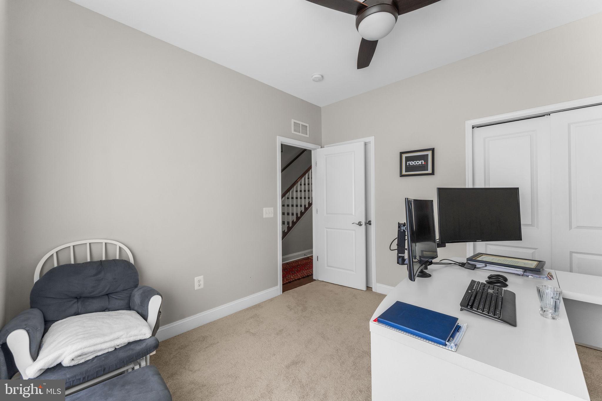 17372 Redshank Road Dumfries, VA 22026 - Photo 5 of 51 a bedroom with a workspace