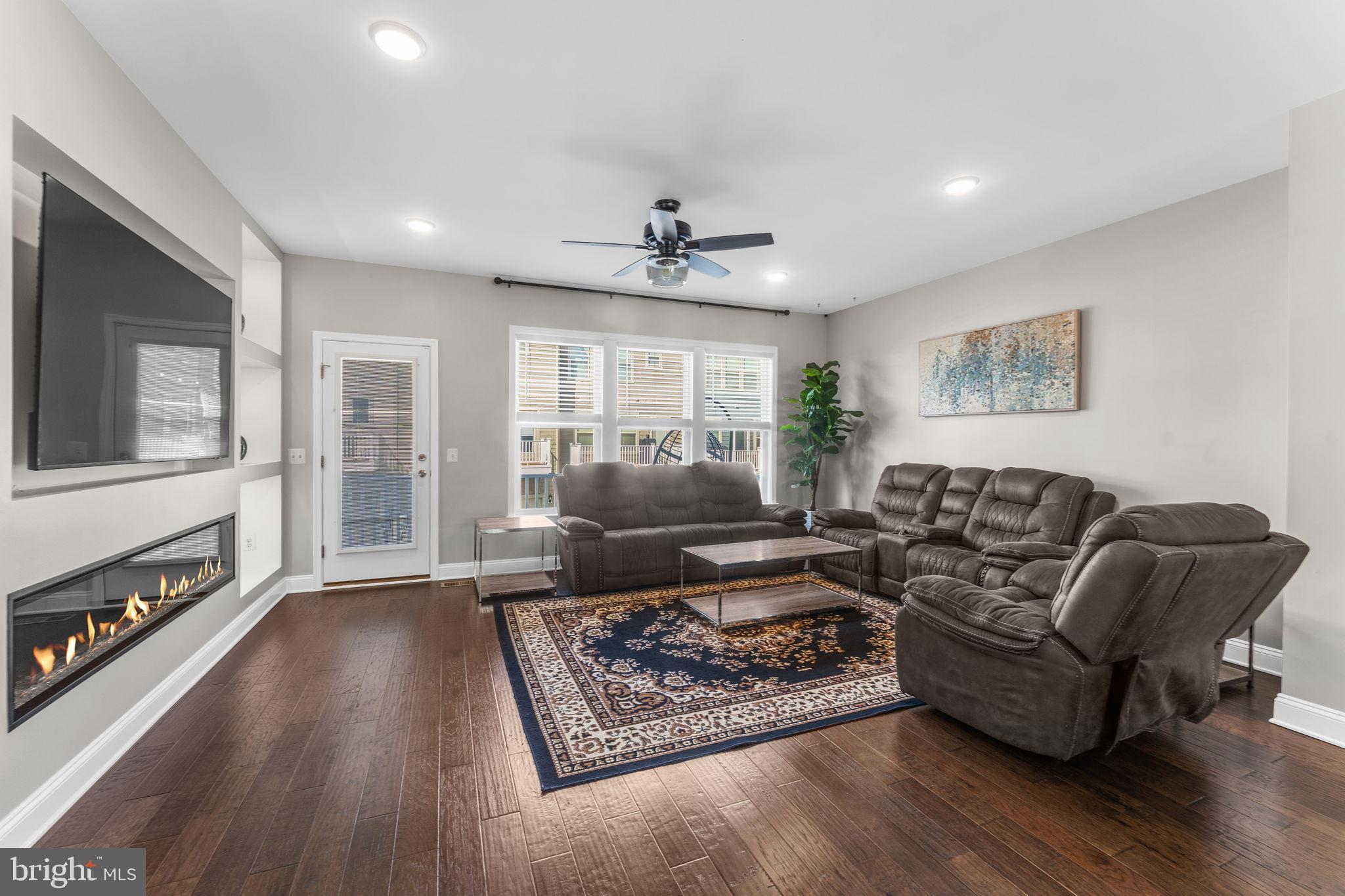 17372 Redshank Road Dumfries, VA 22026 - Photo 7 of 51 a living room with furniture and wooden floor