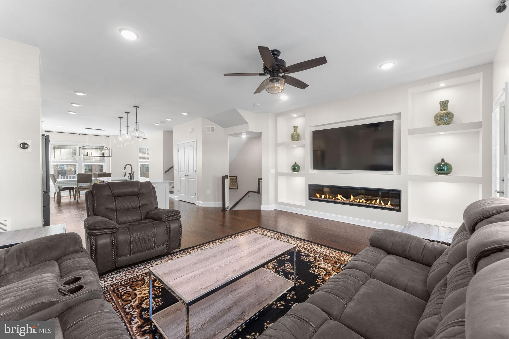 17372 Redshank Road Dumfries, VA 22026 - Photo 10 of 51 a living room with furniture and a flat screen tv