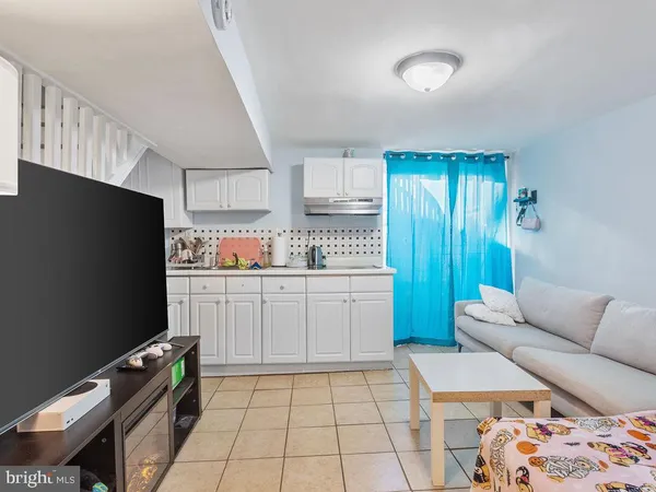 a kitchen with a cabinets and appliances