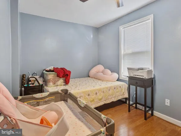 a bedroom with a bed and gym equipment