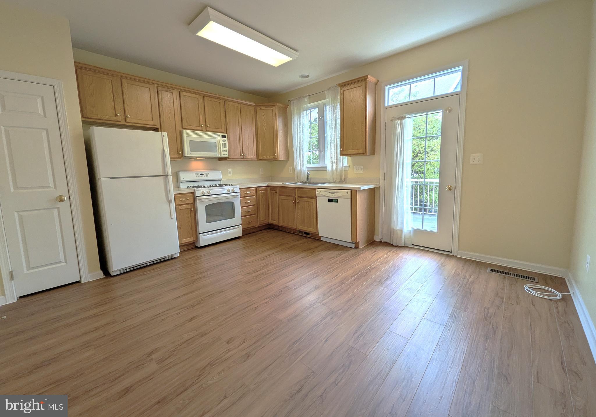 25015 Riding Center Drive Chantilly, VA 20152 - Photo 15 of 40 Kitchen across Family Room