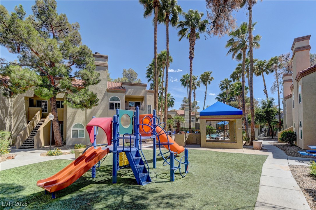 3145 East Flamingo Road, Unit 2080 Las Vegas, NV 89121 - Photo 24 of 26 Community play area with a lawn and a gazebo