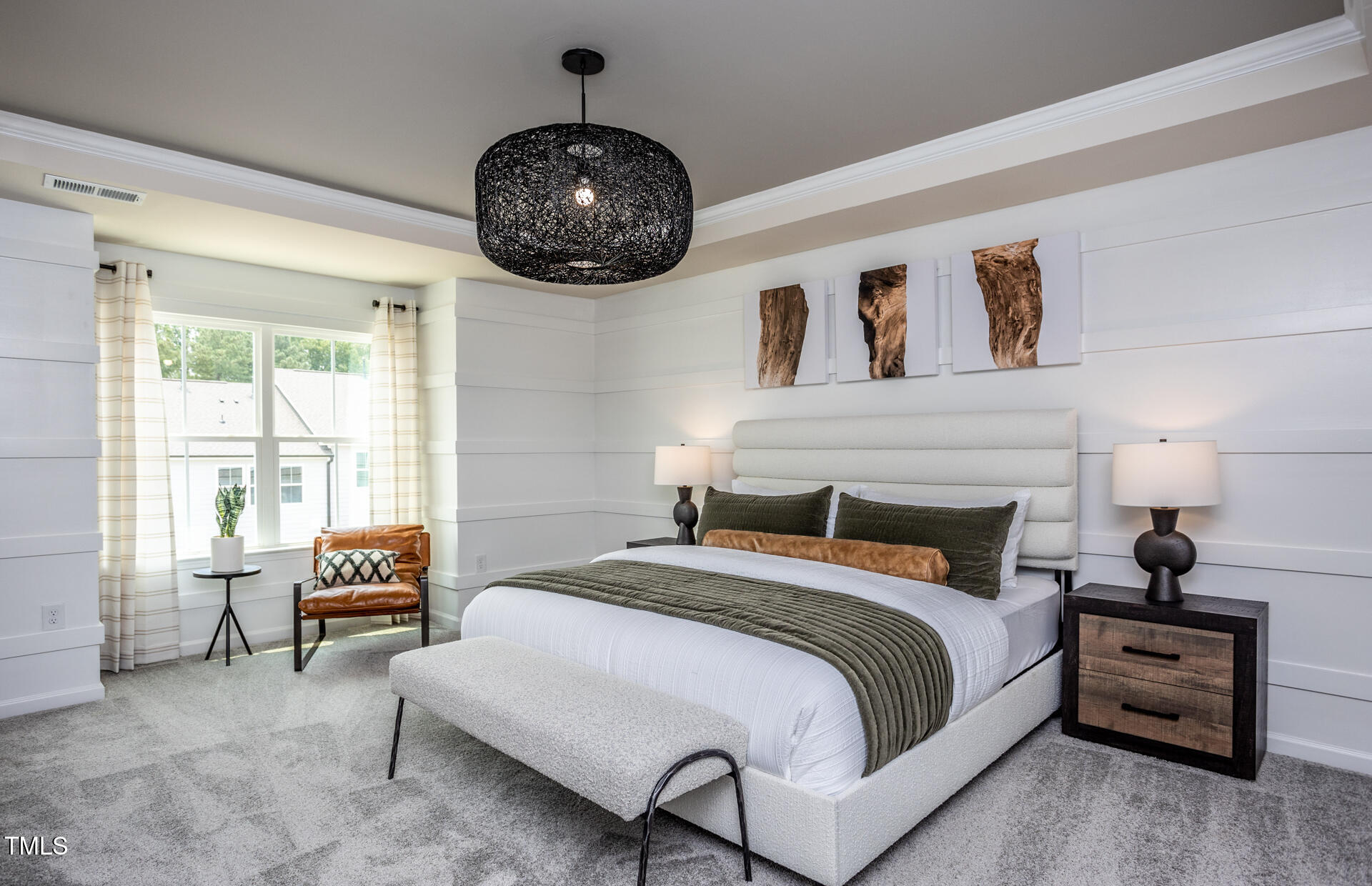 288 Fosterton Cottage Way Raleigh, NC 27603 - Photo 12 of 27 a bedroom with a bed and a chandelier