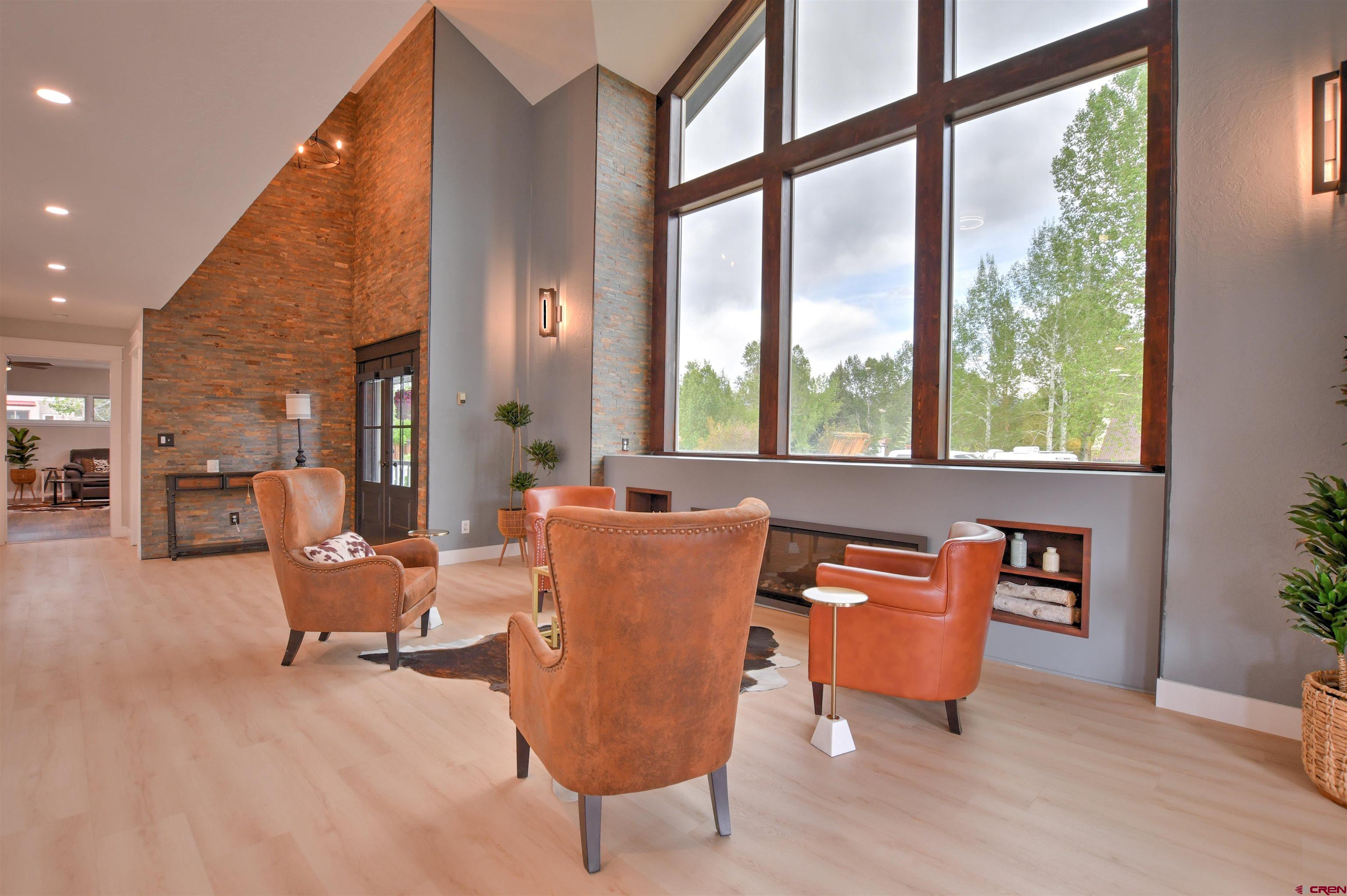 602 Chipeta Drive Ridgway, CO 81432 - Photo 4 of 41 a living room filled with furniture and a window