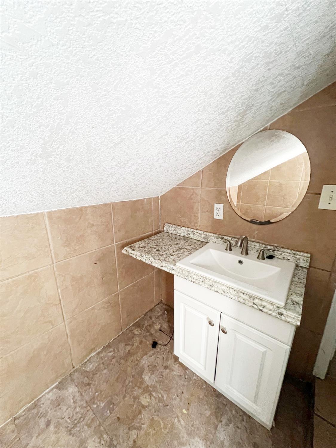 15731 Andrus Island Road Isleton, CA 95641 - Photo 15 of 40 a bathroom with a sink and mirror