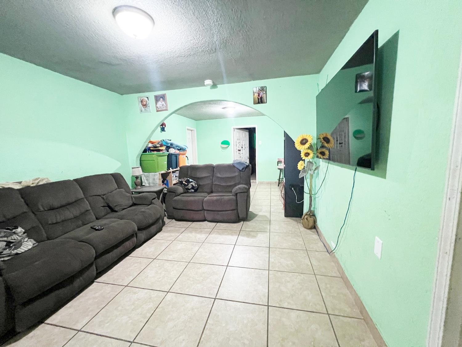 15731 Andrus Island Road Isleton, CA 95641 - Photo 7 of 40 a living room with furniture and a table